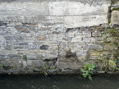 Cracking and local deterioration in a masonry river wall in Dublin